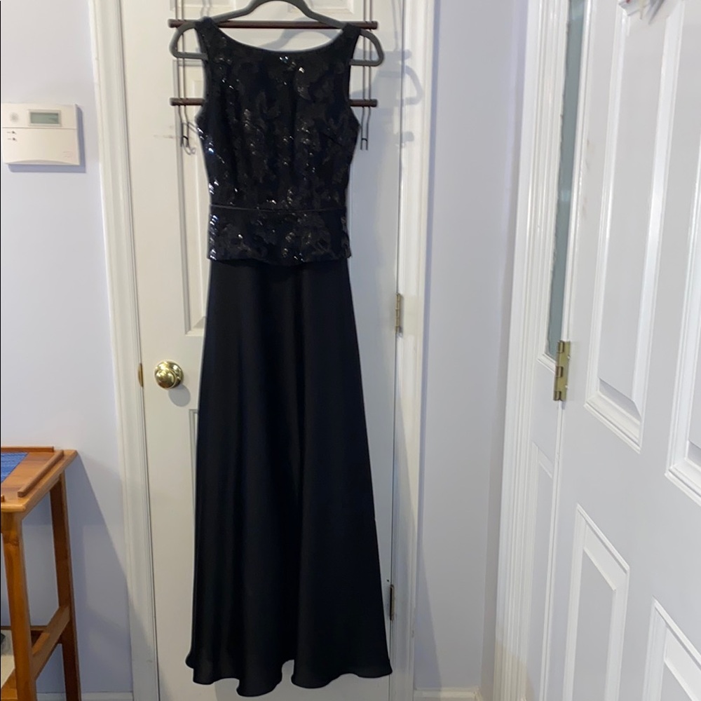Aidan Mattox black full length gown, fitted top with peplum, fully lined
